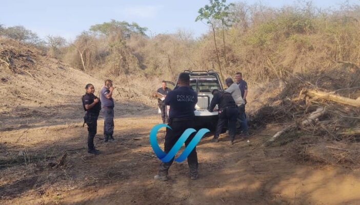 Encuentran cuerpo enterrado en terreno de cribadora